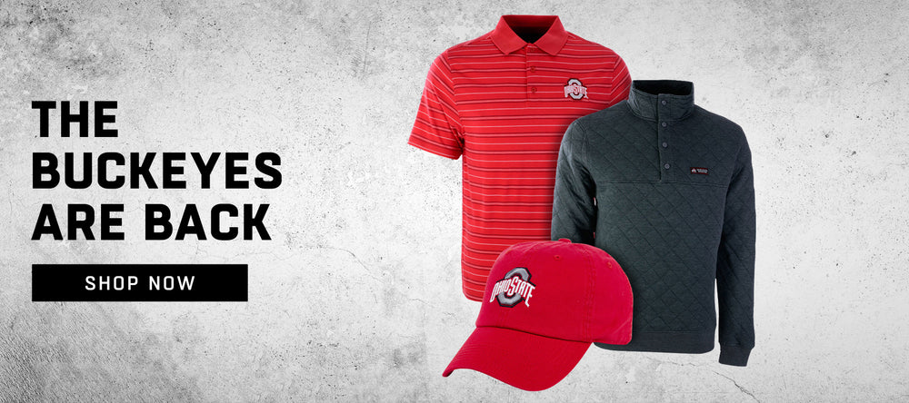 The Buckeyes are back - Shop Now. Three products are featured in front of what appears to be a concrete backdrop. Featured are a red Ohio State ballcap, a black, quilted, quarter-snap mock neck pullover, and a striped red polo shirt.
